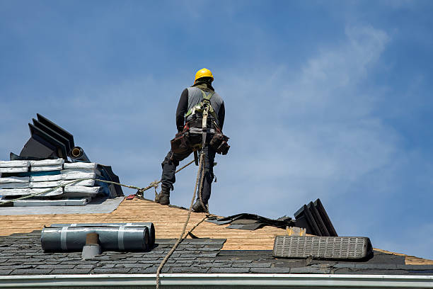 Professional Gutter Installation technician working in Westport, MA